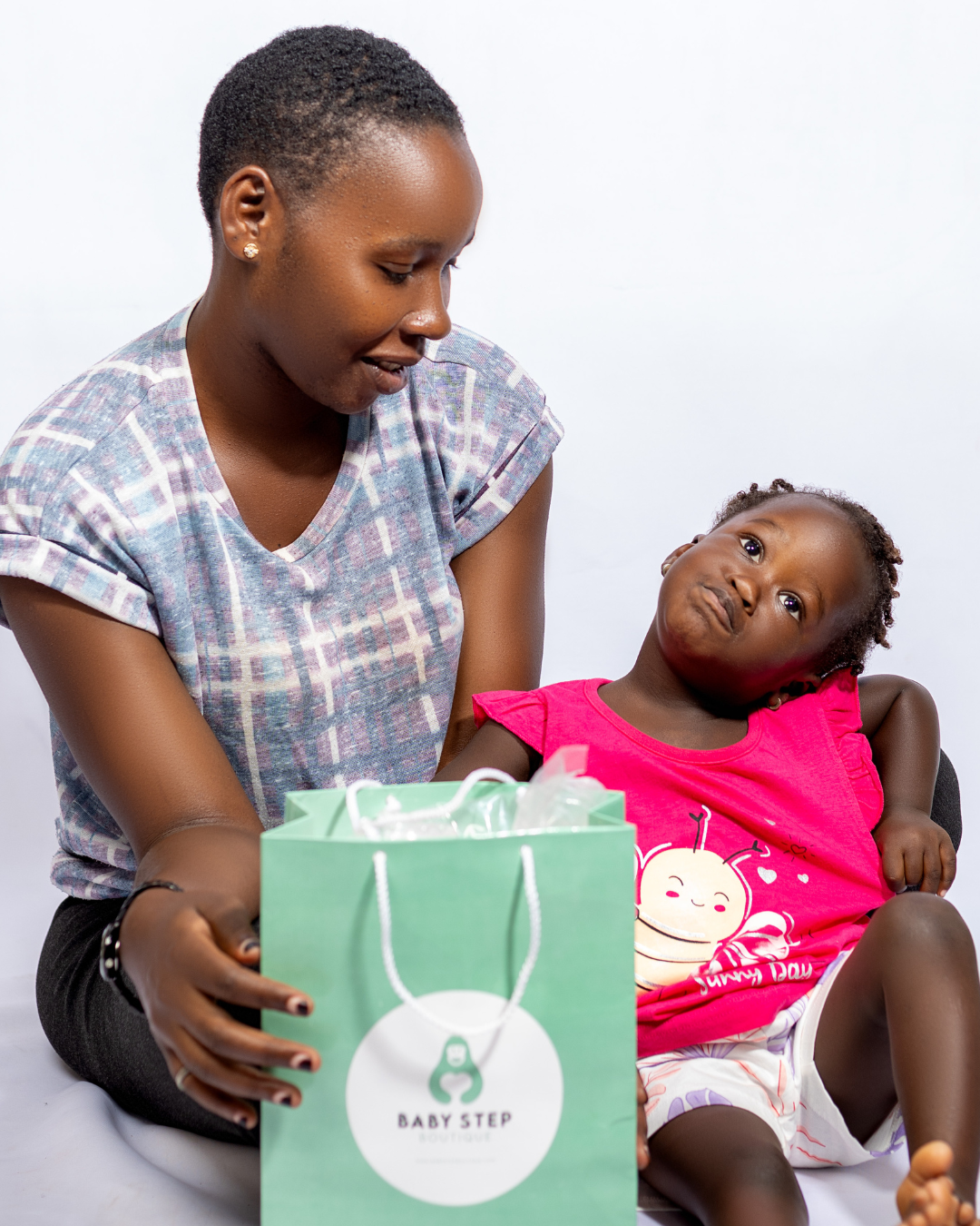 Mom and child with baby step bag